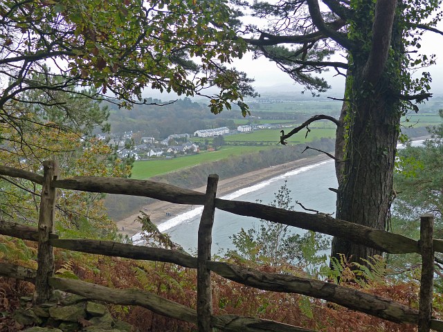 "Llanbedrog beach viewed through trees from the Wales Coast Path"